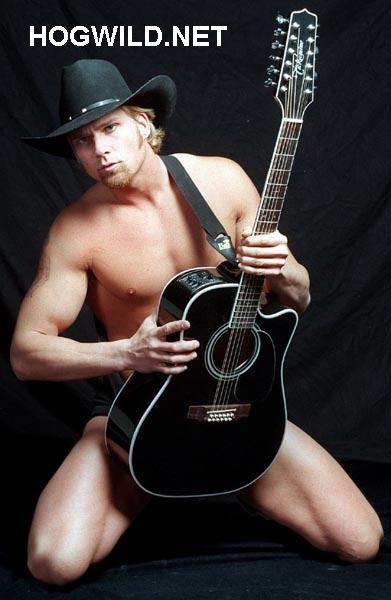 Naked Cowboy's got a big guitar